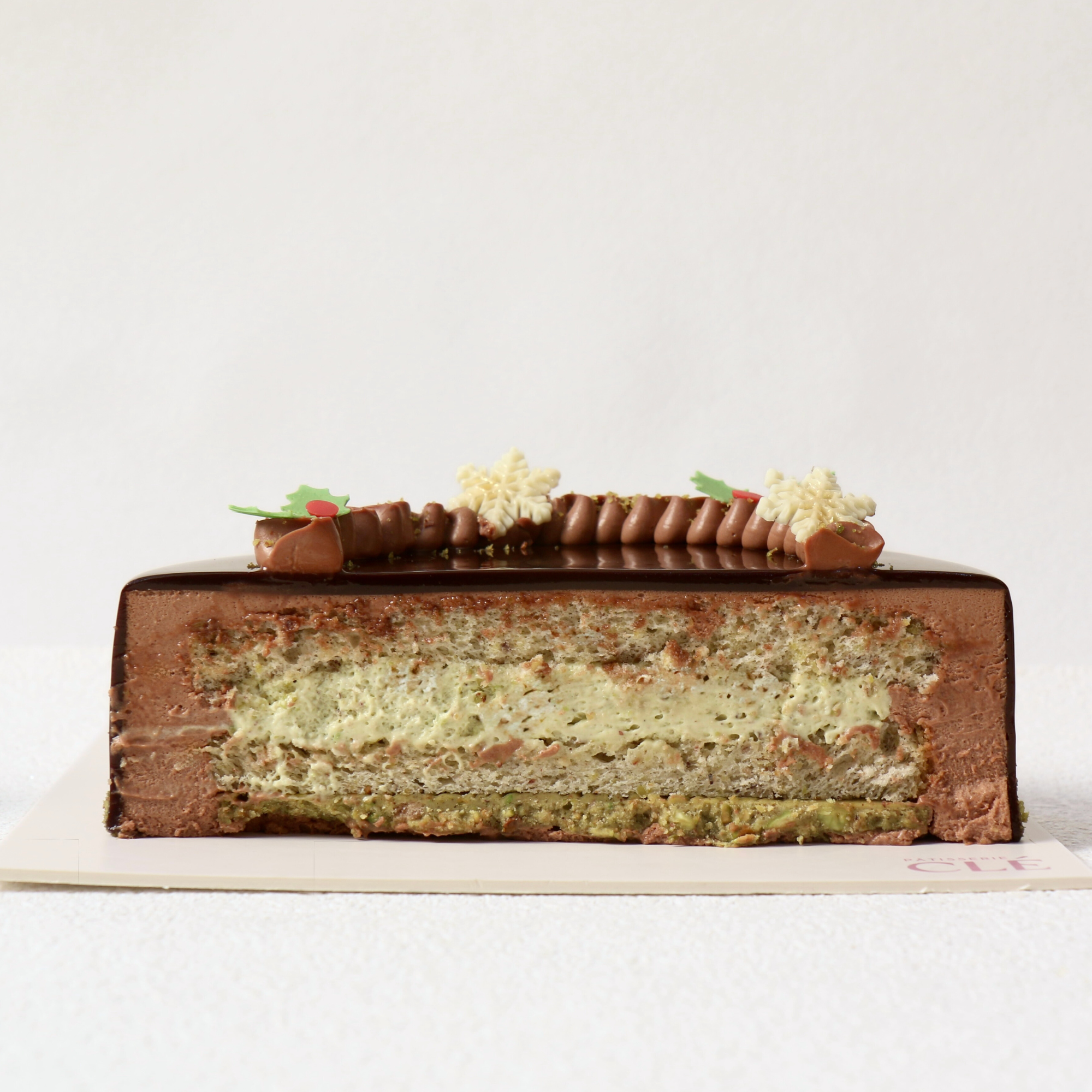 Pistachio Chocolate Cake - cake slice image