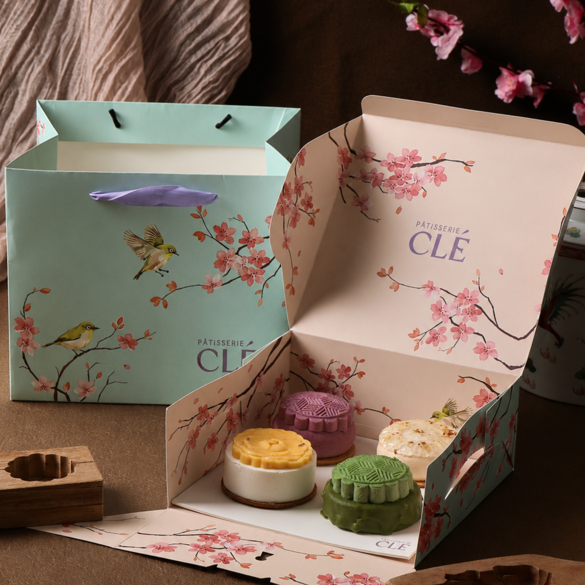 Pâtisserie CLÉ Mid-Autumn Gift Box in its cherry blossom packaging