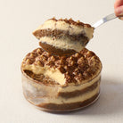 A spoonful of creamy Italian Tiramisu